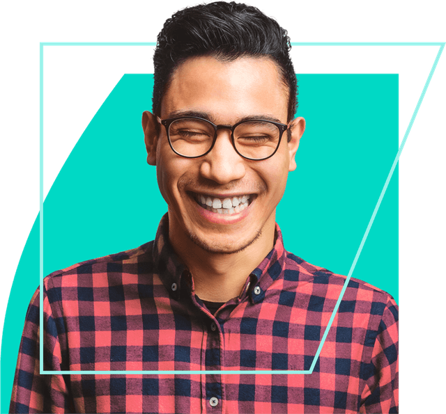 Young man wearing glasses, feeling good and grinning enthusiastically